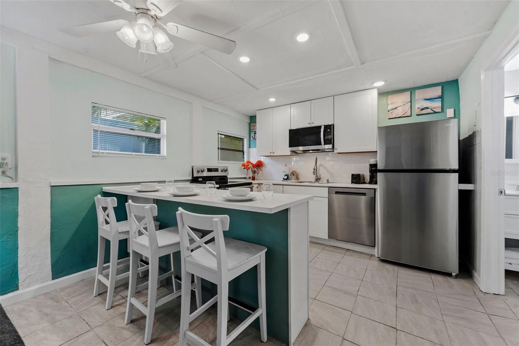 Photo of 3018 Gulf Drive, Holmes Beach, FL 34217 (MLS # A4651692)