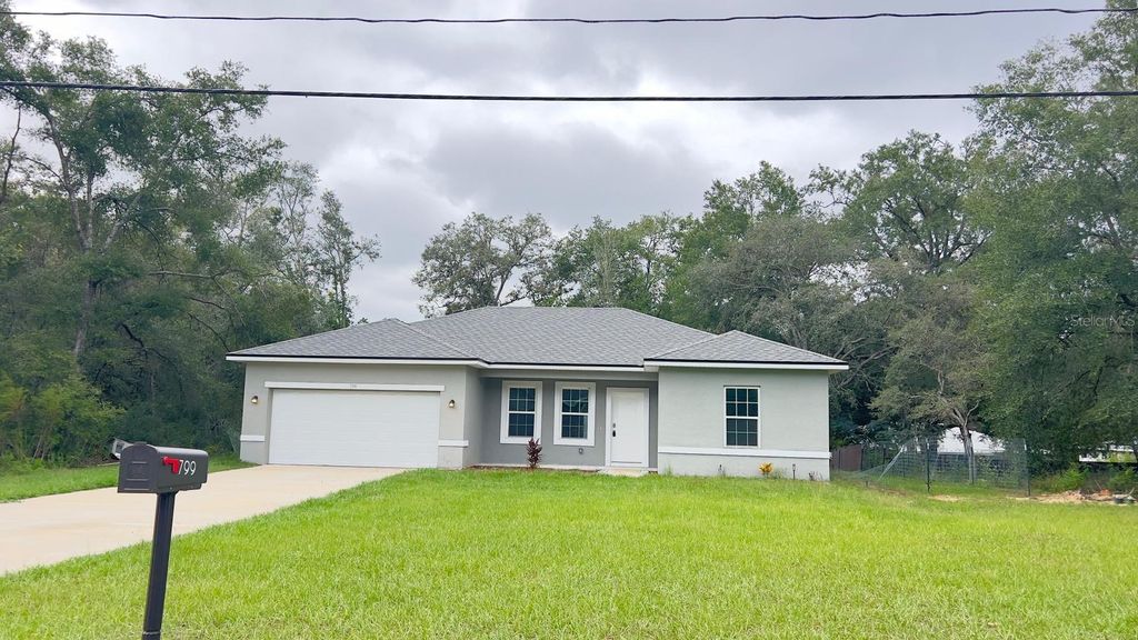 Photo of 799 W Country Club Boulevard, Citrus Springs, FL 34434 (MLS # O6336366)