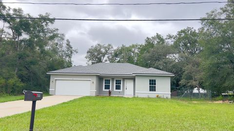 Photo of 799 W Country Club Boulevard, Citrus Springs, FL 34434 (MLS # O6336366)
