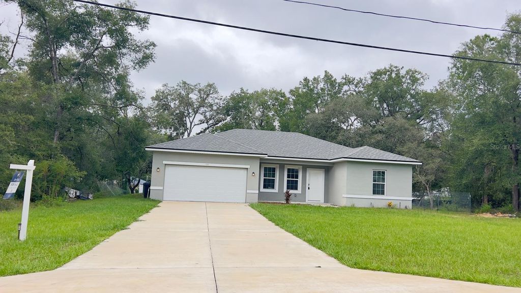 Photo of 799 W Country Club Boulevard, Citrus Springs, FL 34434 (MLS # O6336366)