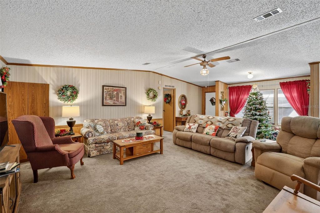 Photo of 11911 Lane Park Rd, Tavares, FL 32778 (MLS # G5105471)