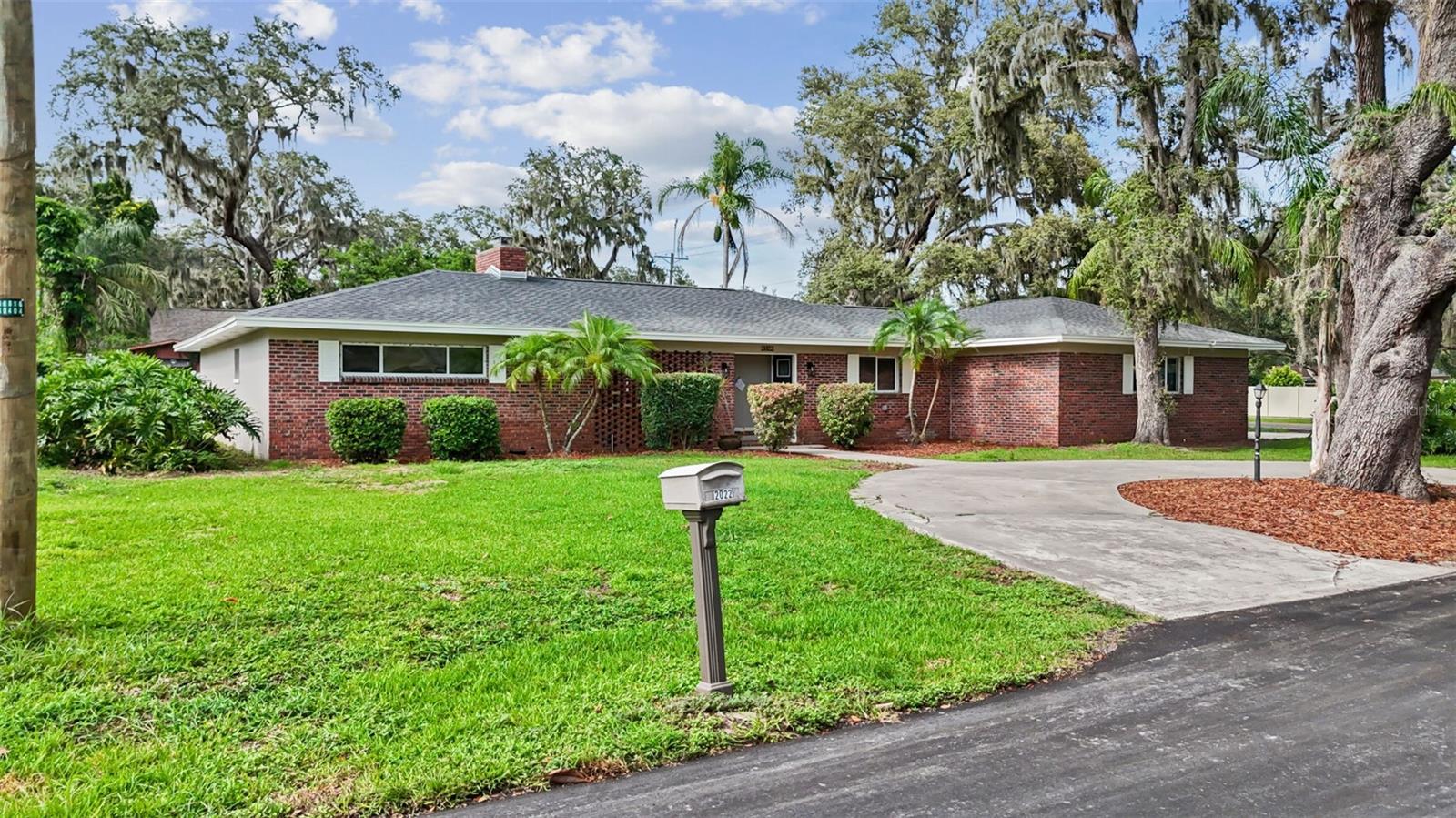 Welcome to this beautifully renovated 3-bedroom, 2-bathroom home located on a desirable corner lot in Valrico! With a 2-car garage and a large, fully fenced backyard, this property offers the perfect blend of modern upgrades and functional outdoor space. Step inside to find two spacious living areas — the primary living room features a charming brick wall accent and cozy fireplace, seamlessly connected to the stunning kitchen, creating an inviting open-concept space perfect for entertaining or relaxing with family. The second living area is separate, offering a versatile space for a home office, playroom, or media room. The kitchen shines with solid wood cabinets, quartz countertops, a custom tile backsplash, designer faucet, and brand-new stainless steel appliances. The home also boasts refinished hardwood floors, new luxury vinyl plank flooring, and a generous laundry room. The master suite is a true retreat with an ensuite bathroom featuring dual sinks and a spacious walk-in closet. Other updates include a NEW ROOF (2025), NEW WATER HEATER (2025), and NEW WELL (2025). All of these amenities and upgrades are complimented by the unique curb appeal of the home which sits on a quiet street! This home has many desirable features and is a must see. Please call us or use ShowingTime to set up a showing today!