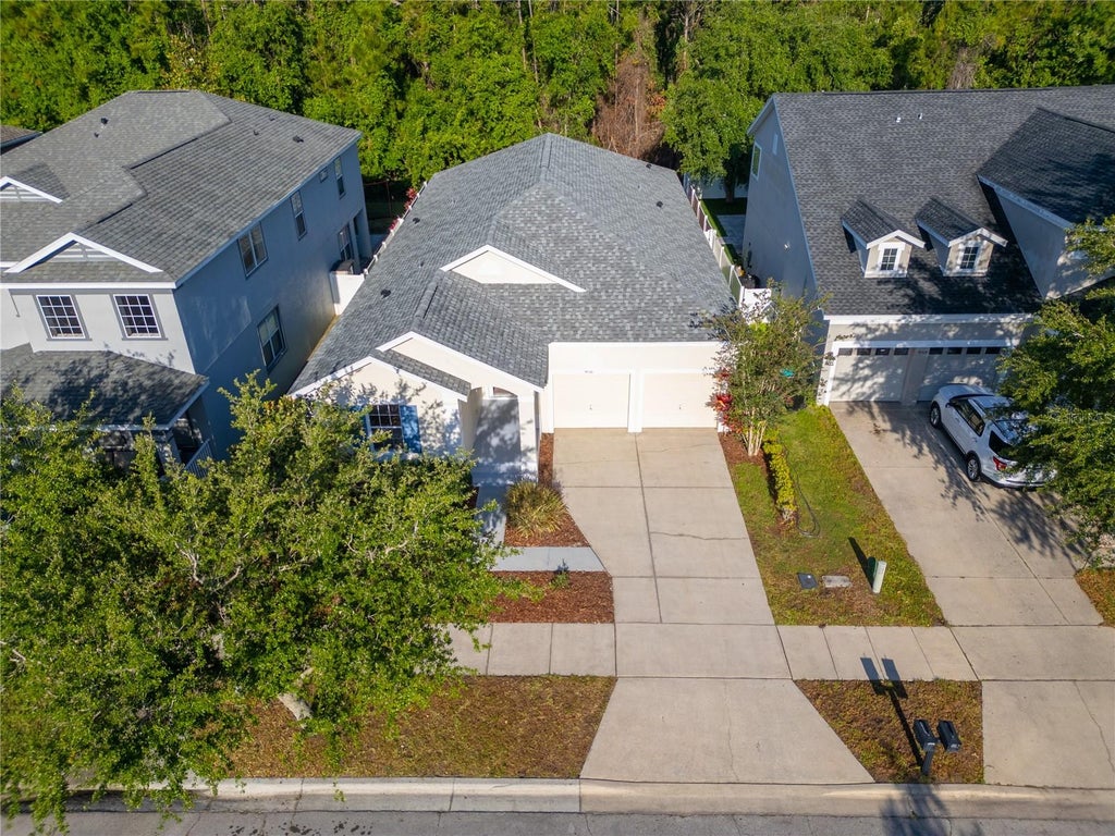 Photo of 9516 Piccadilly Sky Way, Orlando, FL 32827 (MLS # O6433912)