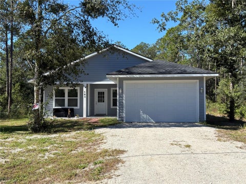 Photo of 103 Long Road, Interlachen, FL 32148 (MLS # GC544367)