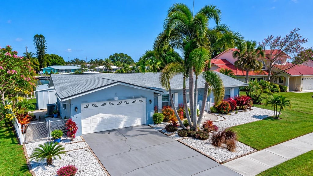 Photo of 563 Lewis Boulevard SE, St Petersburg, FL 33705 (MLS # TB8560989)