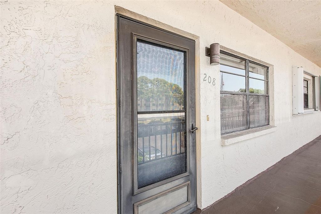 Photo of 7951 58th Avenue N #208, St Petersburg, FL 33709 (MLS # TB8505660)