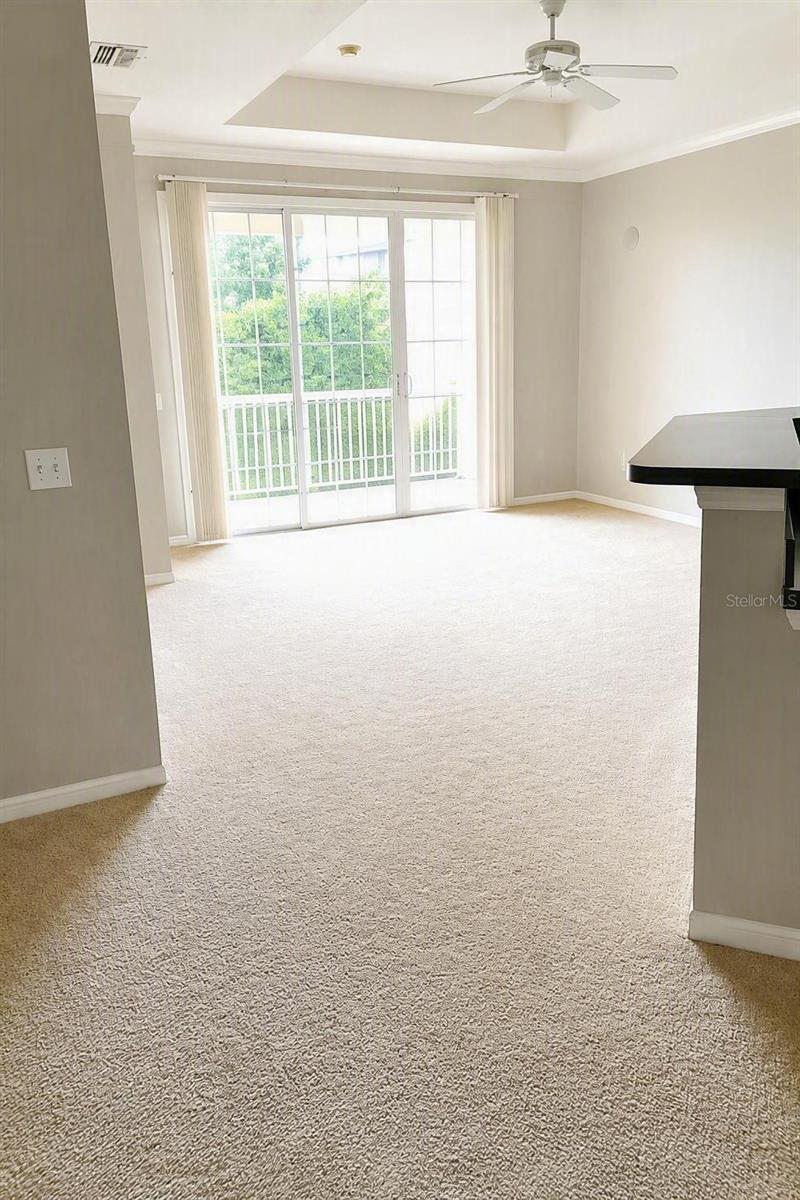 Photo of 6412 Queens Borough Avenue #309, Orlando, FL 32835 (MLS # O6437181)