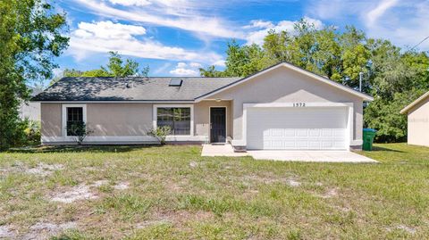 Photo of 1572 Monticello Street, Deltona, FL 32725 (MLS # O6399574)