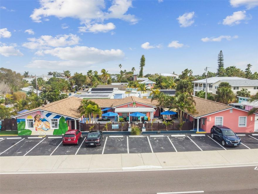 Auction Property. 10 cap rate! Welcome to Cabanas of Treasure Island, a boutique hotel in the heart of Treasure Island. This recently renovated, licensed hotel features 12 rooms. This hotel is zoned and licensed for daily rentals. There are 3 studios each with 2 queen beds, 4 king bed studios, 4 one-bedroom suites with a kitchenette and additional pull-out sofa with a Tempurpedic sofa mattress in the living area. There is also a private 1 bedroom suite with kitchen for roomier or extended stays. Extensive renovations were completed and the hotel was relaunched in March 2023. Guests are greeted by a custom, locally painted mural inspired by a vintage postcard. The relaxing courtyard beckons guests to lounge and enjoy the Gulf breezes and sunshine. Guests love the plush seating, family games and BBQ grill with picnic table for those who enjoy grilling on vacation. There is ample parking for guests and the rooms feature the convenience of self check-in. Guests love the proximity to the beach across the street. Guests will love the few steps to the sand and multiple restaurants and live music options nearby. Guests will also love the close proximity to John's Pass Village & Boardwalk, Pinellas County's #1 tourist attraction - it's only a 2 minute drive, short trolley ride or 15 minute walk away. Guests will rave over the 100+ merchants with unique retail shops, restaurants, dolphin and fishing tours, boat and jet ski rentals, and parasailing.