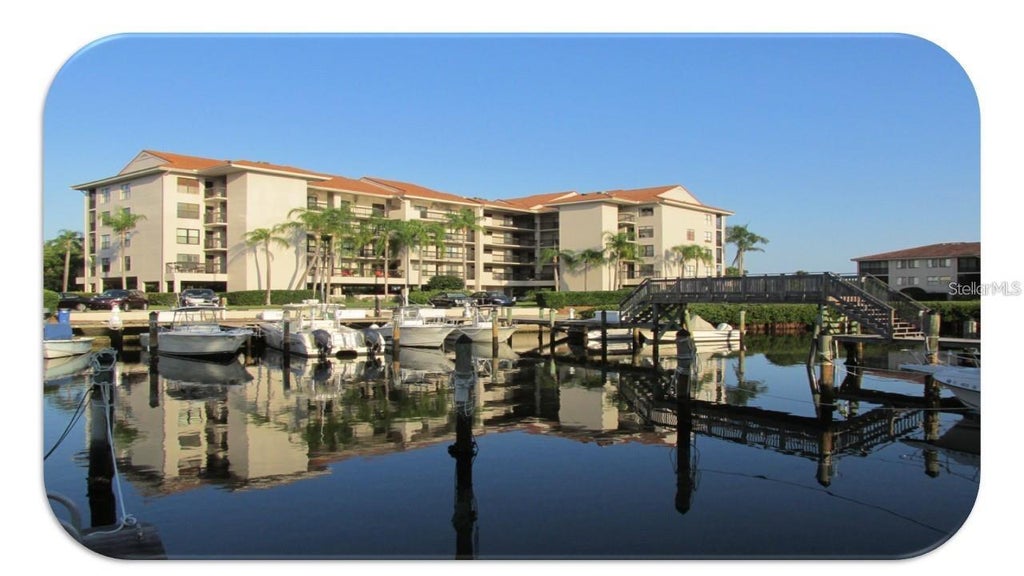 Photo of 1806 Mariner Drive #318, Tarpon Springs, FL 34689 (MLS # TB8554820)