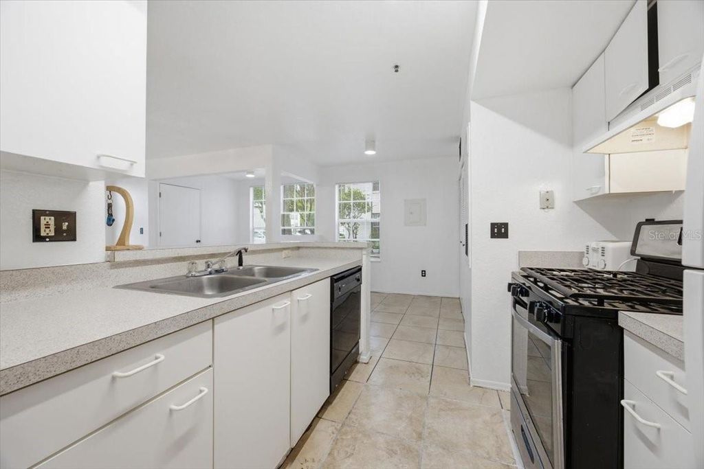Photo of 1602 Columbia Arms Circle #106, Kissimmee, FL 34741 (MLS # O6418676)