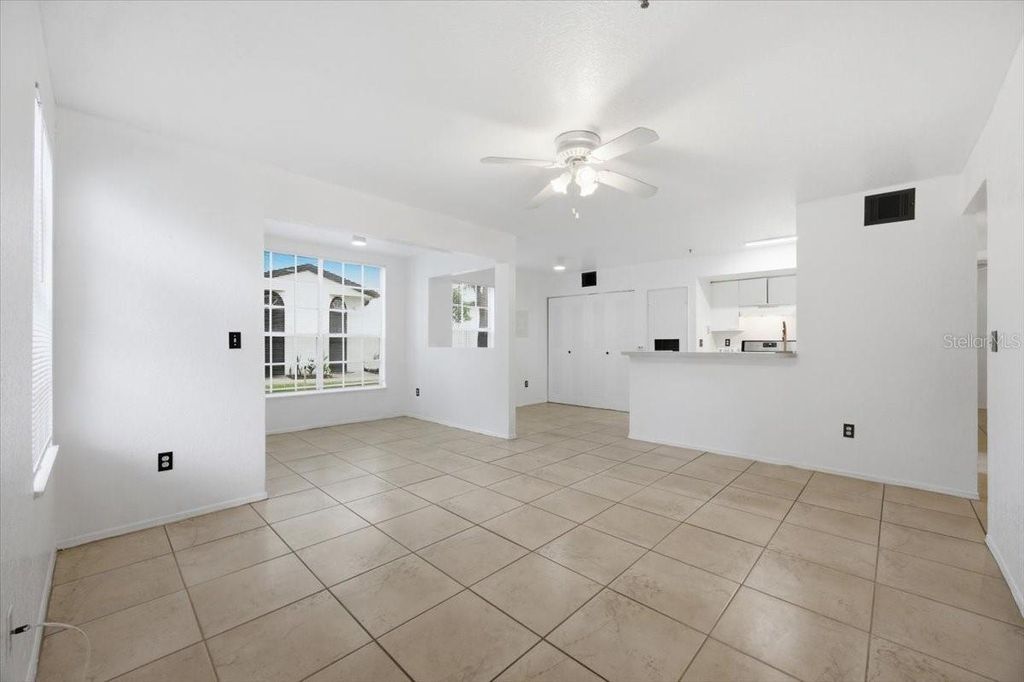 Photo of 1602 Columbia Arms Circle #106, Kissimmee, FL 34741 (MLS # O6418676)