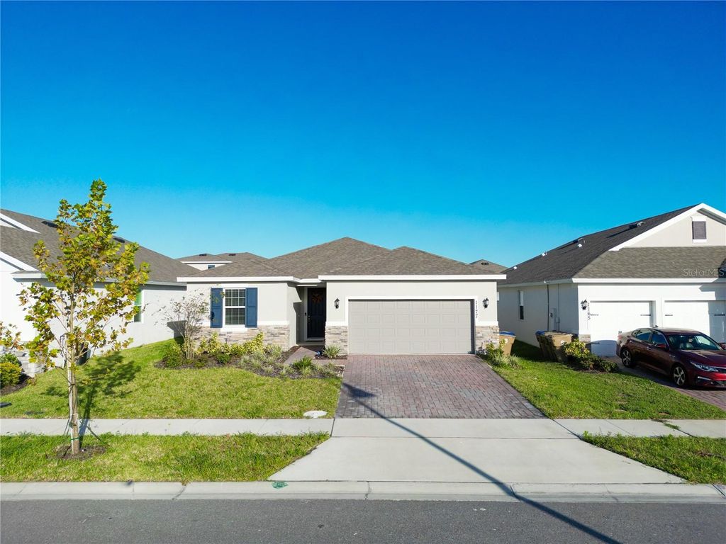 Photo of 1177 Fox Hedge Lane, Saint Cloud, FL 34771 (MLS # S5136265)