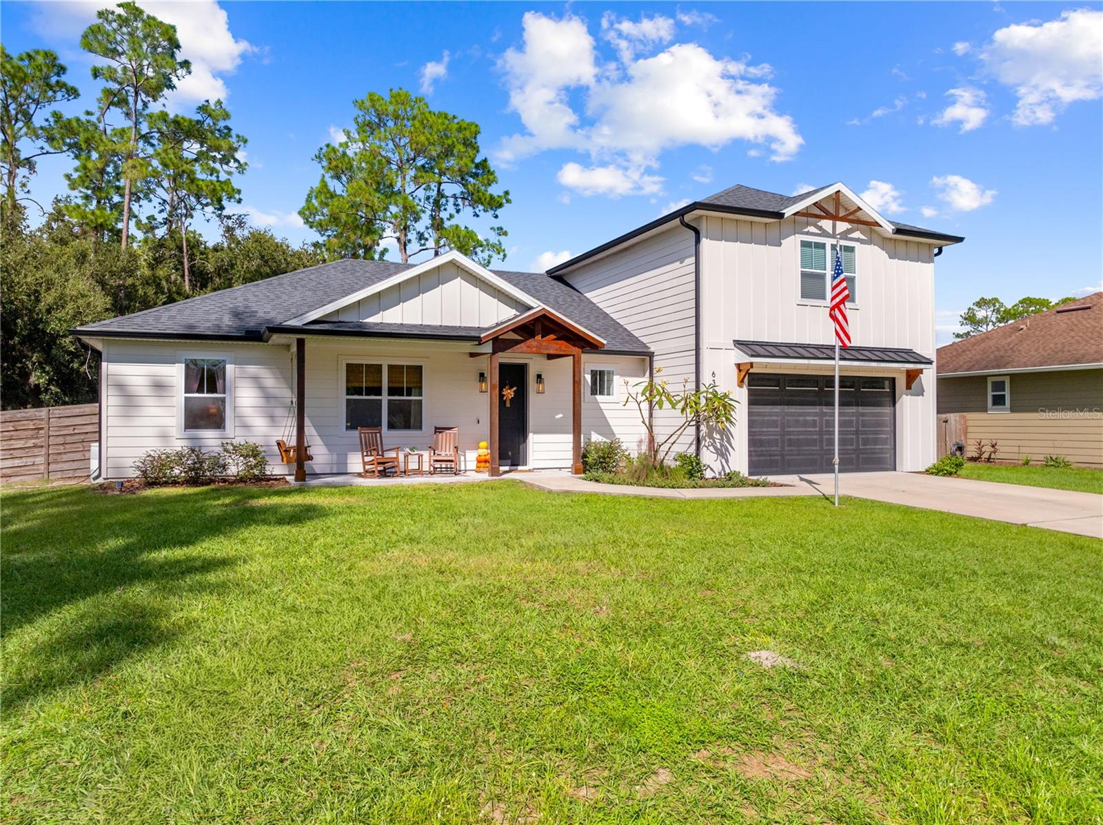 Welcome home to this stunning custom-built 4-bedroom, 3-bath retreat where quality craftsmanship and thoughtful design meet modern country living! From the moment you walk in, you’ll be greeted by an open floor plan filled with natural light, luxury vinyl floors, and beautiful views that create a sense of calm and space. The gourmet kitchen is the heart of the home—featuring quart countertops, stainless steel appliances, a stylish backsplash, custom-built cabinets, and a island breakfast bar that’s perfect for family gatherings or casual mornings with coffee. The adjoining dining and living areas flow seamlessly together, ideal for entertaining or relaxing evenings at home. Step through the sliding glass doors to your fully fenced backyard oasis, complete with a lovely garden area and plenty of room to enjoy outdoor living. The spacious primary suite offers a peaceful retreat with a spa-like bathroom featuring a garden tub, dual sinks, and a generous walk-in closet. Upstairs, discover the versatile fourth bedroom or bonus room with its own full bath—a wonderful space for guests, a home office, or a media room. There’s even unfinished attic space offering endless possibilities for future expansion or storage. Designed for comfort and efficiency, this home includes energy-saving spray foam insulation, a 4-zone A/C system, tankless water heater, whole-home water softener, and window blinds throughout. The large indoor laundry room adds convenience to everyday living. Enjoy country living at its finest with access to a private community boat ramp that leads directly into the Alligator Chain of Lakes—perfect for boating, fishing, and weekend adventures. This is more than a home—it’s a lifestyle of comfort, quality, and tranquility. Come see the attention to detail and discover why this custom-built beauty is the perfect place to call your own!