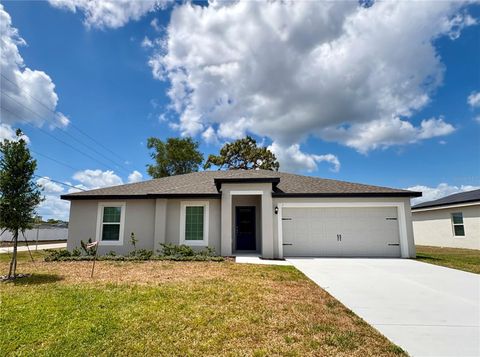 Photo of 1 Zinnia Lane E, Poinciana, FL 34759 (MLS # TB8402770)