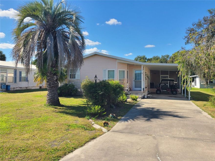 Make your Florida winter dreams come true! This home is located across the street from Brownwood Paddock Square with no HOA fees. You get some of the fun of The Villages lifestyle without the extra costs.
Walk into a open living space with a cozy breakfast nook in the front corner. Big windows let in tons of natural light. The kitchen has plenty of counter space and cabinets, plus a stainless steel French door refrigerator. The living and dining area gives you lots of room to arrange your furniture however you like.
The primary bedroom is huge and runs across the entire back of the house. Double doors open to your private bathroom with two sinks, a separate room for the toilet, and a walk-in shower. The walk-in closet has built-in organizers to keep everything neat. There's also a nice second bedroom and a guest bathroom with an updated vanity.
The laundry room is inside with a front-load washer and dryer that stay with the home. Step out the side door to your screened patio and storage room. There's another storage shed out back too. This home comes fully furnished as shown so you can move right in and start enjoying your new life.
Please note this home will need a new roof and polybutylene pipe replacement. It's priced accordingly and is cash or conventional financing only. The home has solid plywood subfloors and is structurally sound. Plus, all of the windows have been replaced  with double pane windows.