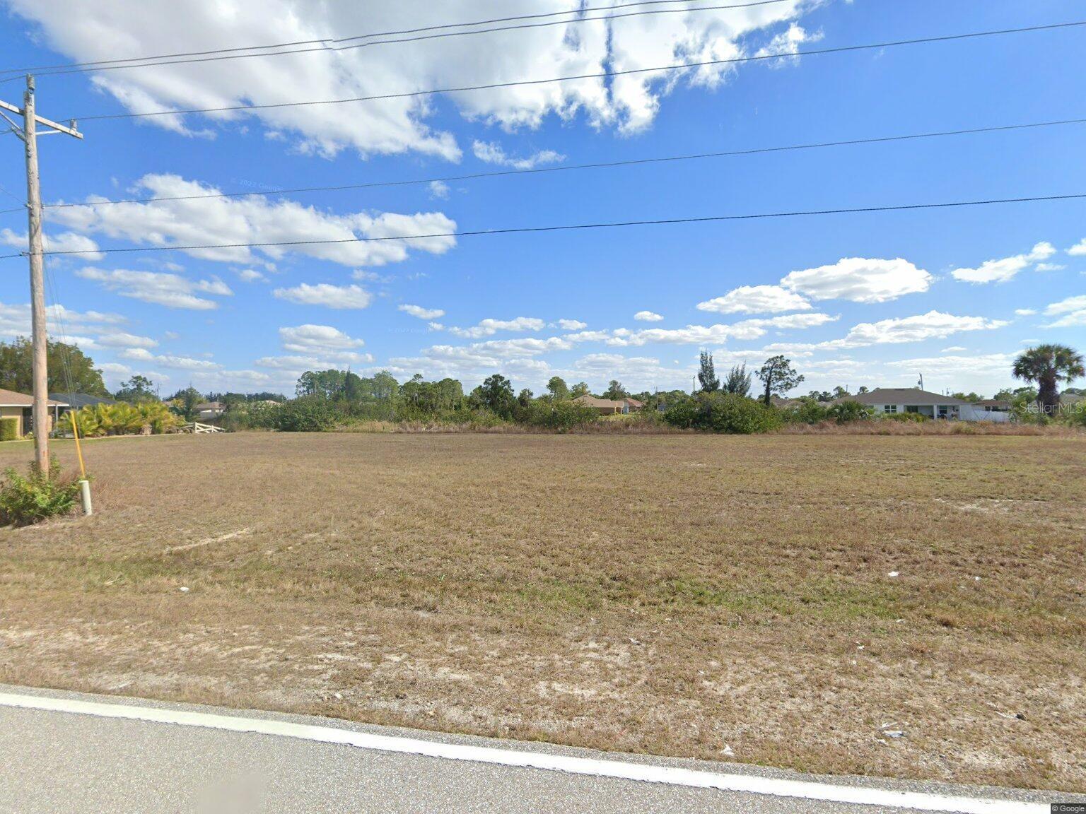 Welcome to your opportunity to own a prime piece of land in the growing community of Cape Coral! This spacious vacant lot offers the perfect canvas to build your dream home, vacation retreat, or investment property. Located in a highly desirable area, this property combines convenience with a peaceful residential setting. The lot provides easy access to main roadways, shopping, dining, schools, and recreational activities. Just minutes from the Gulf Coast’s world-famous beaches and vibrant lifestyle, you’ll enjoy the best of Florida living right at your doorstep. With plenty of room for a custom home, pool, and outdoor living space, this parcel is ideal for those looking to create their own tropical paradise. Cape Coral continues to see strong growth, making this an excellent investment opportunity for the future. Don’t miss out on securing this property—whether for personal use or as part of your real estate portfolio, 900 Vogiantzis Parkway has endless potential!