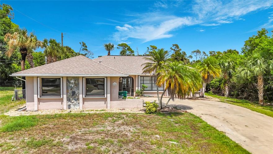 Spacious pool home in the heart of Port Charlotte with endless potential! Featuring vaulted ceilings and a split open, airy layout, this home offers generous living space perfect for entertaining or everyday comfort. The large kitchen provides plenty of cabinet and counter space and overlooks the main living areas. Hurricane shutters, sliding glass doors, and mature landscaping enhance both functionality and curb appeal.

A unique flex space in the garage adds versatility for a home office, gym, workshop, or additional storage. This property is a fixer-upper and needs updating along with some TLC, making it a great opportunity for investors, seasonal residents, or buyers looking to add their personal touch and build equity.

Enjoy Florida living with your private solar heated pool with covered lanai, and convenient location near shopping, dining, schools, and everyday amenities. Just 6 miles from Port Charlotte Harbor, offering easy access to boating, waterfront parks, fishing, and sunsets along the Gulf Coast.

Priced to sell, sold As-Is — don’t miss this opportunity!