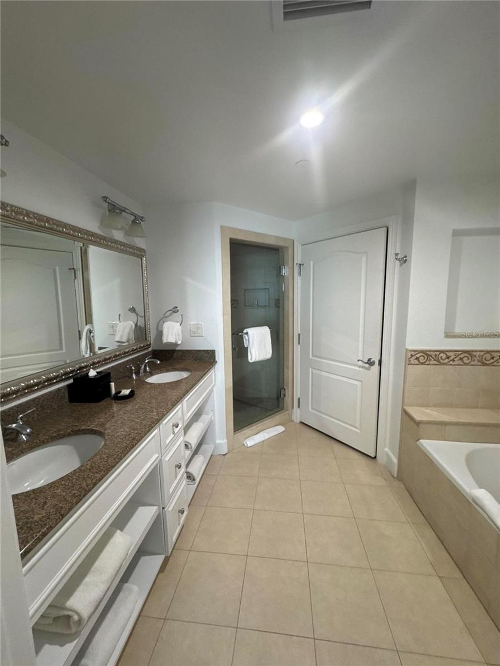 Photo of 7593 Gathering Drive #307, Reunion, FL 34747 (MLS # O6396429)