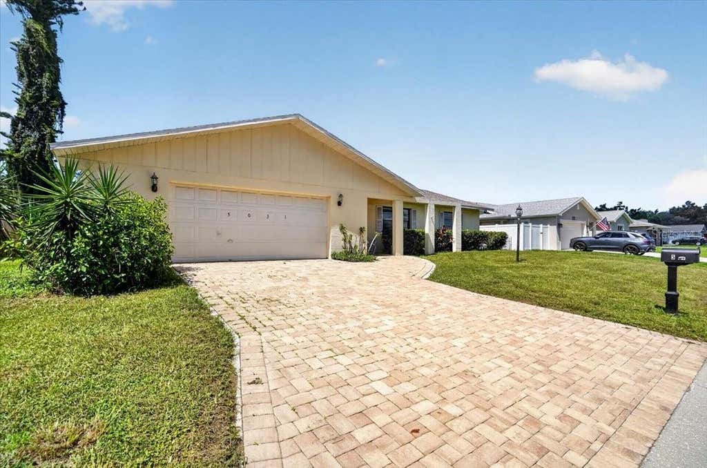 Photo of 5031 Brandeis Circle S, Sarasota, FL 34243 (MLS # A4703007)