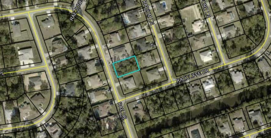 The vacant lot at 107 Rae Dr in Palm Coast, FL is a prime opportunity to build your dream home in a peaceful, established neighborhood already surrounded by beautiful homes, offering both stability and creative freedom. The 0.23-acre property is ideally located just south of Palm Coast Parkway and US-1, providing easy commuting and growth potential, while being under 8 miles from the Atlantic beaches for added lifestyle and resale value. Daily conveniences are close by, with Starbucks only 0.6 miles away, a Publix supermarket nearby, and multiple shopping and dining options within minutes. For leisure, residents can enjoy Washington Oaks Gardens State Park with its formal gardens, beaches, and trails, or visit the Florida Agricultural Museum for family-friendly history and activities. Travel is also convenient, with the Flagler Executive Airport located just a few miles away for private aviation, and both Daytona Beach International Airport and Northeast Florida Regional Airport in St. Augustine about 27 miles away for commercial flights. Don’t wait, go directly and visit the land to experience its prime location and potential for yourself.