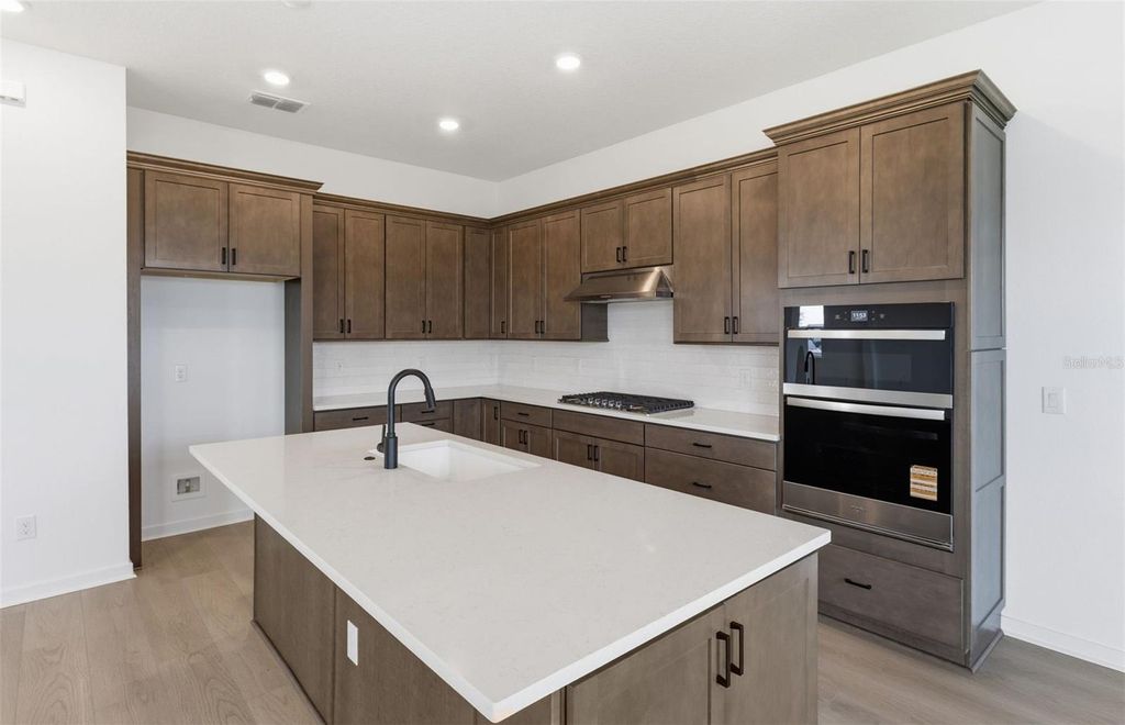 Photo of 7009 Depue Drive, Wesley Chapel, FL 33545 (MLS # TB8428755)