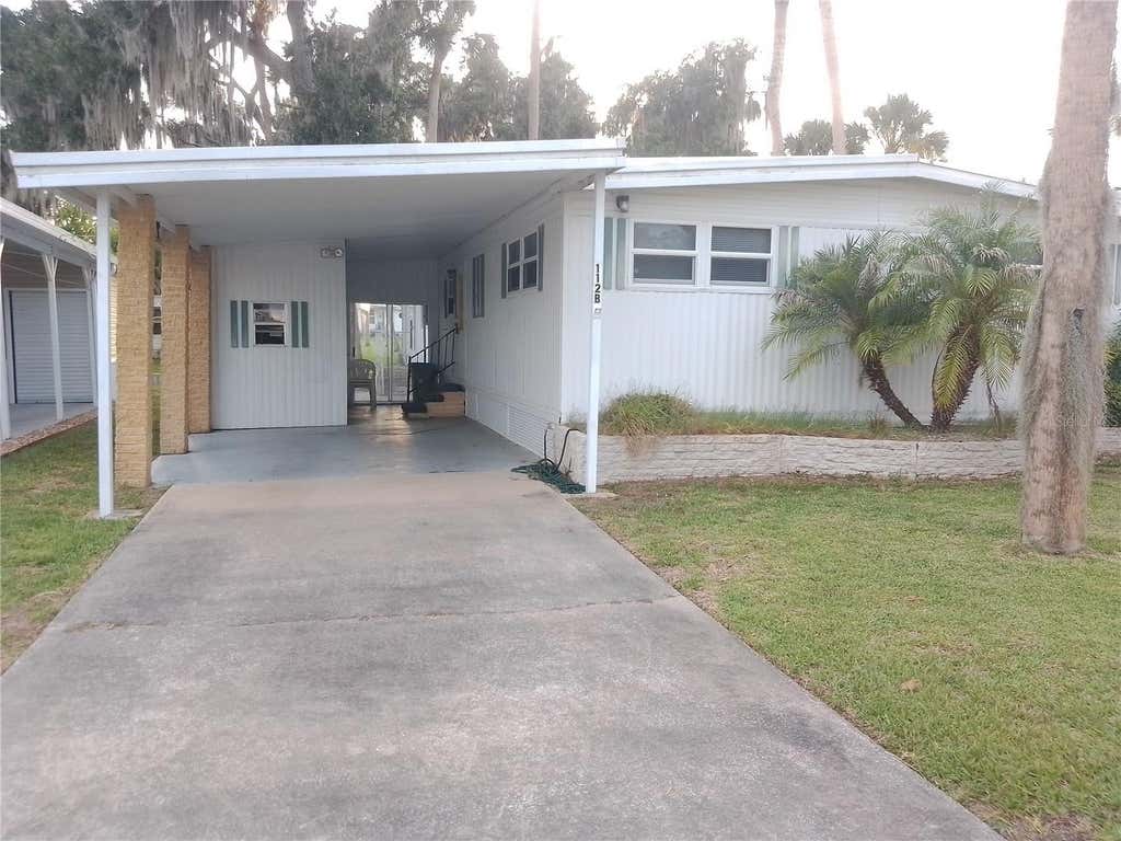 Photo of 112 Palm Drive #B, Eustis, FL 32726 (MLS # G5114121)