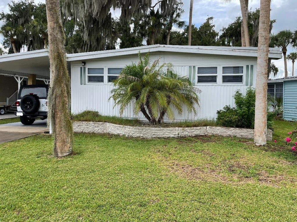 Photo of 112 Palm Drive #B, Eustis, FL 32726 (MLS # G5114121)