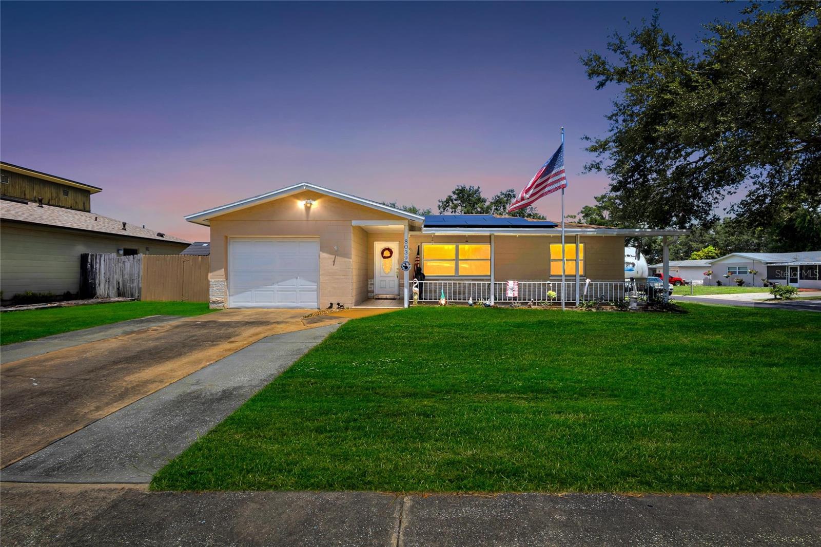 NO FLOOD ZONE! PRIVATE POOL HOME! NO HOA! SAVE $$$ ON LOWER UTILITY COSTS WITH SOLAR PANELS; WHICH WILL BE PAID OFF AT CLOSING FOR THE BUYER! Your Tropical Oasis Waits! Located on a spacious 1/4 Acre corner lot. Plenty of room to BRING YOUR RV/BOAT! This home includes 4 Bedrooms, 3 Full Bathrooms, and attached garage. The 4th Bedroom features a guest / In-Law Suite with its own private entrance! Inside the home is a 3 way split bedroom floorplan. A Large Family Room and a BEAUTIFUL kitchen with a seated Breakfast Bar as well as a large dining area with Sliders out to your Beautiful Sparkling Free Form Style Pool.The kitchen features Sleek stainless-steel appliances, Granite countertops, tons of wood cabinets, pantry & a subway tile backsplash. The back bedroom can be utilized as a double primary bedroom, or as a guest or In Law suite, with access from the lanai! Outside, is a beautifully maintained backyard, with a covered lanai, fire-pit, sprawling pool, Storage Shed and fenced in yard! This home has so much to offer! Do not miss out on this opportunity, call today to schedule a private viewing!