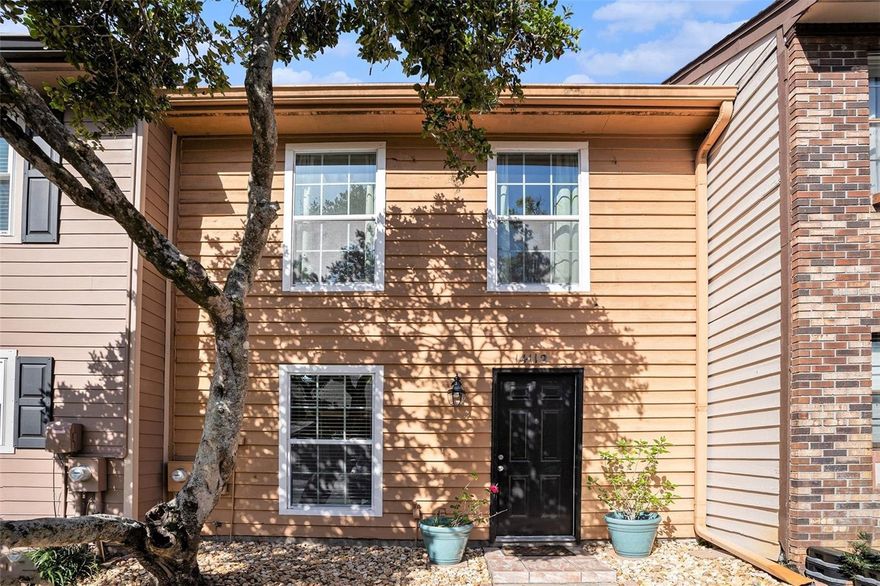 One or more photo(s) has been virtually staged. If you’ve been looking for a townhome that feels spacious, practical, and move-in ready in the heart of Carrollwood, this one checks all the boxes.  The spacious kitchen features granite countertops, stainless steel appliances, and a large walk-in pantry, all opening to a versatile bonus room. Sliding glass doors lead to an expanded 6-foot pavered patio creating a space that is perfect for grilling, relaxing, or hosting friends. The bonus room offers flexibility to fit your lifestyle and could easily serve as a home office, playroom, or formal dining area. With both bedrooms upstairs and a convenient half bath downstairs for guests, the layout offers comfort and functionality for everyday living and entertaining. The primary suite includes a walk-in closet with a custom shelving system and a private ensuite bathroom featuring a tiled shower. Major updates include roof replacement in 2020, hurricane-rated windows in 2020, HVAC in 2019, and a new water heater in 2022.
This quiet community offers a pool for residents to enjoy, along with two assigned parking spaces and ample visitor parking. Centrally located near restaurants, shopping, major highways, and everything that makes Carrollwood has to offer, this home combines convenience, thoughtful updates, and low-maintenance living in one of Tampa’s most established neighborhoods.