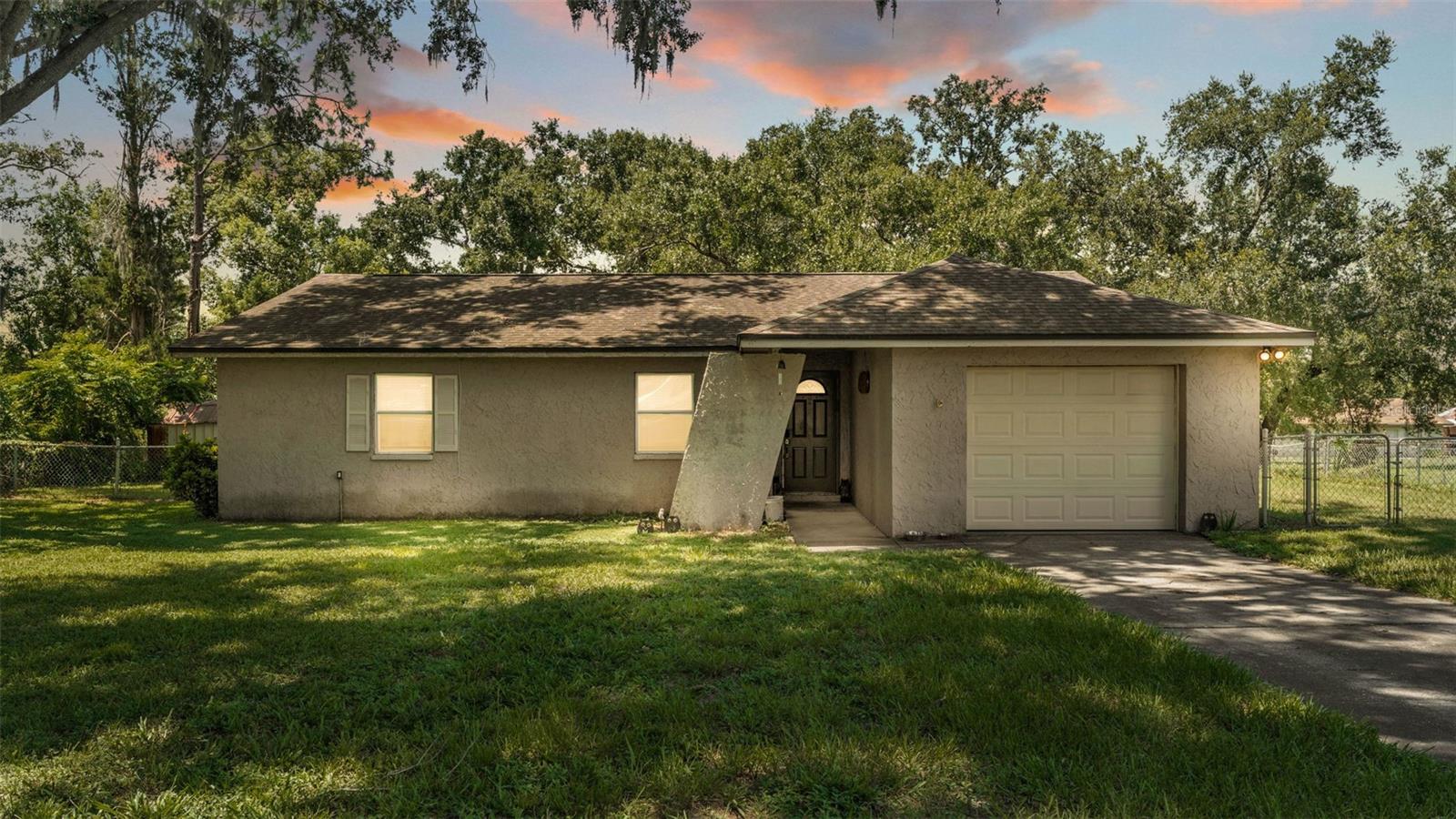 Opportunity Awaits with this North Lakeland gem! This charmer is a 3 bedroom, 2 bath block home that sit on an oversized shaded lot in a peaceful neighborhood with NO HOA. Featuring a cozy wood-burning fireplace, a formal dining room, and plenty of storage, it’s ready for your personal touch. Big ticket updates are already done...Roof & Garage Door (2018), Septic Drainfield (2022), AC (2022), and Hot Water Heater (2023)—giving you peace of mind while you focus on the fun cosmetic updates.
Perfect as a starter home or investment property, this one won’t last long—schedule your showing today!