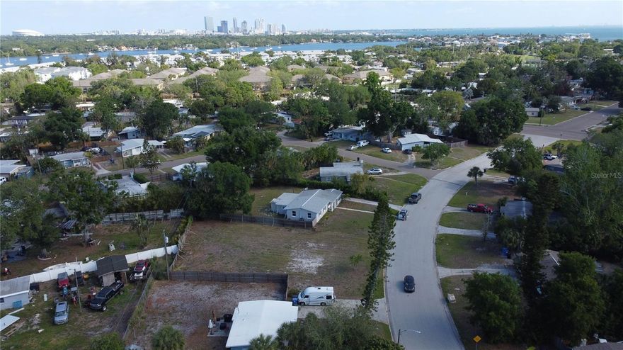 ADU eligible! One of the only vacant lots on Coquina Key exceeding 10,000 sq ft, making this a rare opportunity to build your primary residence plus a guest house, rental unit, or in-law suite — income potential that's nearly impossible to find on this island.
Walking distance from Coquina Key Park, featuring pickleball, tennis, basketball, soccer, a dog park, and areas to fish. Boat ramps are accessible within minutes. Whether it's a sunset cruise on the Gulf or a morning fishing trip, the island is the perfect location for world-class water access. All of this just 10 minutes from downtown St. Petersburg and 20 minutes from the beach — island tranquility without sacrificing convenience.Vacant land this size on Coquina Key rarely hits the market. Whether you're building a dream home, vacation retreat, or investment property, this is the opportunity you've been waiting for.
***The lot is cleared and ready to build!***
Bitcoin may be considered as a form of payment for this transaction, subject to mutually agreed terms.