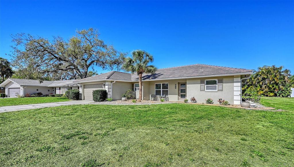 Photo of 7480 Blaine Way, Sarasota, FL 34231 (MLS # A4687247)