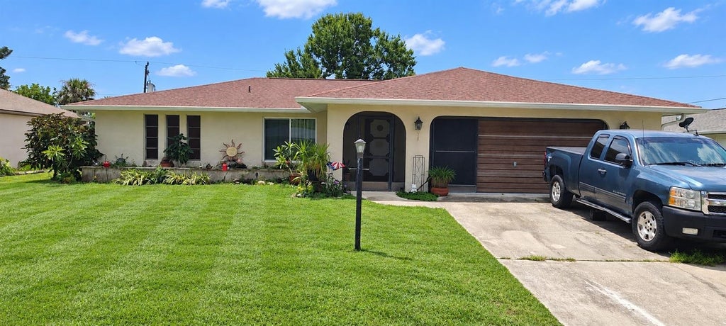 Photo of 22199 Lancaster Avenue, Port Charlotte, FL 33952 (MLS # A4708980)
