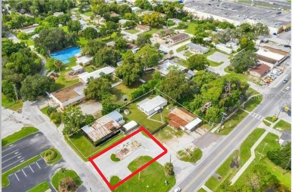 Photo of 4650 Mile Stretch Drive, Holiday, FL 34690 (MLS # O6278936)