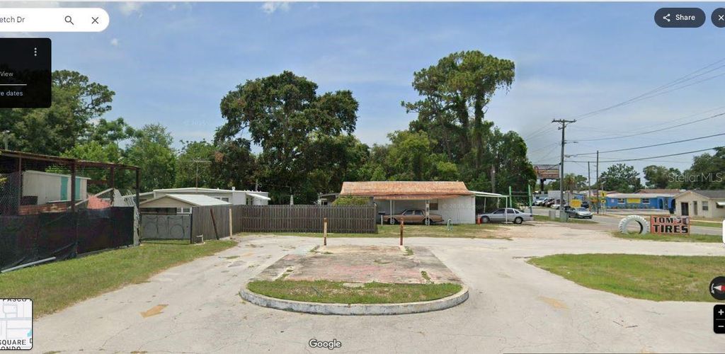 Photo of 4650 Mile Stretch Drive, Holiday, FL 34690 (MLS # O6278936)