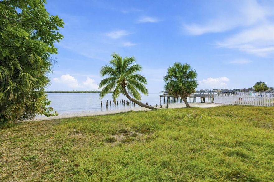 Rare open-water homesite with panoramic views in coveted Northeast St. Petersburg—offered with approved building plans for a new custom home. This exceptional waterfront parcel features 65 feet of direct open-water frontage on just under ¼ acre, providing a rare opportunity to begin construction immediately and bypass the lengthy entitlement and design process.
Enjoy unobstructed boating access with no bridges to open Tampa Bay—ideal for sailboat and powerboat owners. The property showcases sweeping views of Weedon Island, delivering breathtaking sunrises, tranquil open water, and frequent dolphin and wildlife sightings that define the true Florida waterfront lifestyle in an active coastal setting with nearby parks, waterfront walking paths, and neighborhood amenities for jogging, cycling, and dog walking and it's own private beach.
Whether envisioning a modern coastal masterpiece or a timeless waterfront estate, this open-water homesite—complete with approved building plans, offers an unmatched combination of views, boating access, and readiness to build, making it an extraordinary opportunity for discerning buyers.