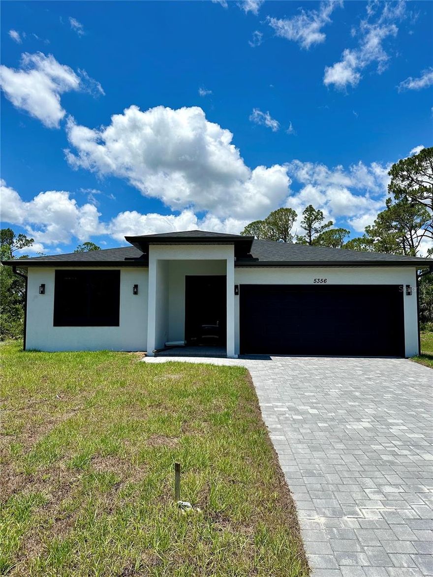 Welcome to your dream home in North Port, Florida!
This brand-new, move-in ready home features 3 bedrooms, 2 bathrooms, a versatile den or office, and a 2-car garage. Enjoy a bright, open floor plan with soaring ceilings, luxury vinyl plank flooring, and a chef-worthy kitchen with quartz countertops, stainless steel appliances, a large island, and walk-in pantry.

The spacious primary suite offers a walk-in closet and spa-like bathroom with dual vanities and a glass-enclosed shower. Two additional bedrooms provide space for family or guests. Step outside to a private backyard perfect for relaxing.

Located in a thriving community near top-rated schools, shopping, dining, parks, and just a short drive to Gulf Coast beaches like Siesta Key and Venice Beach. With easy access to I-75, Sarasota and Fort Myers are within reach.

Schedule your private tour today—this stunning home won’t last!