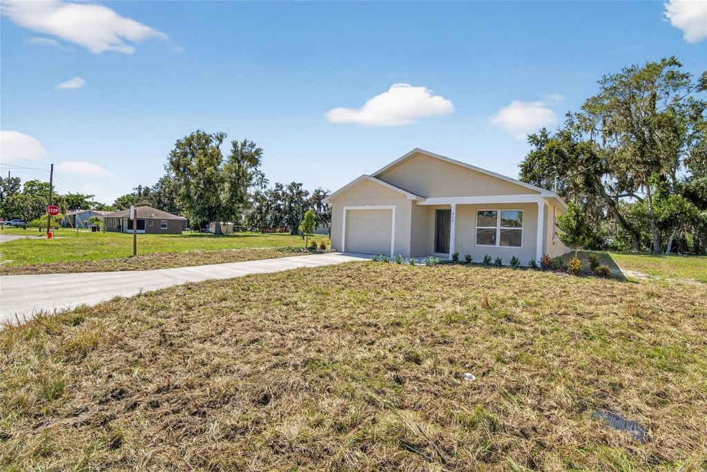 Photo of 718 Seminole Avenue S, Fort Meade, FL 33841 (MLS # L4956702)