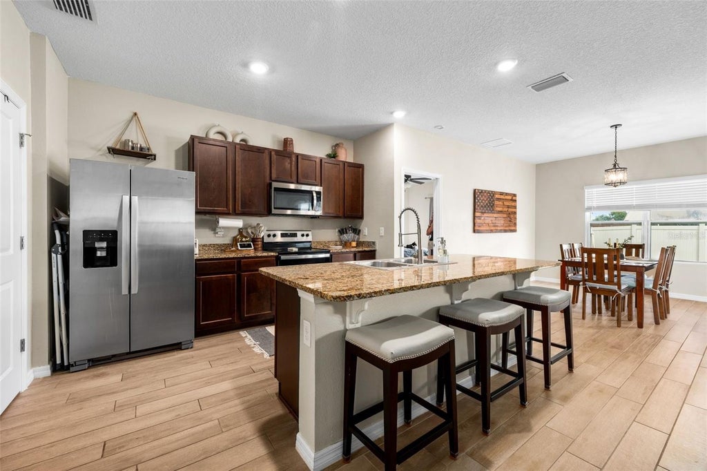 Photo of 6043 SW 83rd Terrace, Gainesville, FL 32608 (MLS # GC543078)
