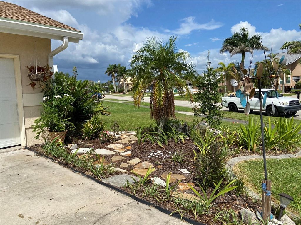 Photo of 262 Fry Terrace SE, Port Charlotte, FL 33952 (MLS # NS1085614)