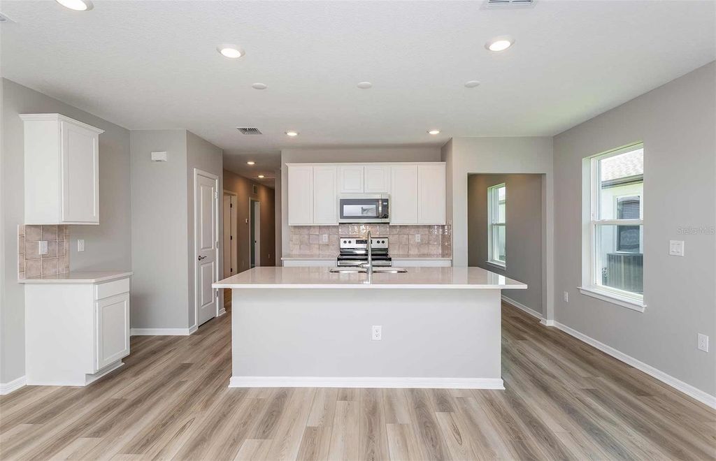 Photo of 3831 Benham Rise Road, Spring Hill, FL 34609 (MLS # TB8504927)
