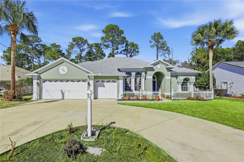 Photo of 39 Woodhollow Lane, Palm Coast, FL 32164 (MLS # FC316024)