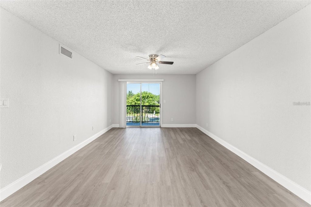 Photo of 1932 Lake Atriums Circle #69, Orlando, FL 32839 (MLS # S5155498)