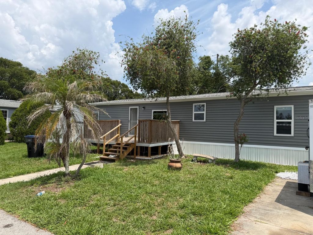 Photo of 6999 Pompeii Road, Orlando, FL 32822 (MLS # O6422614)