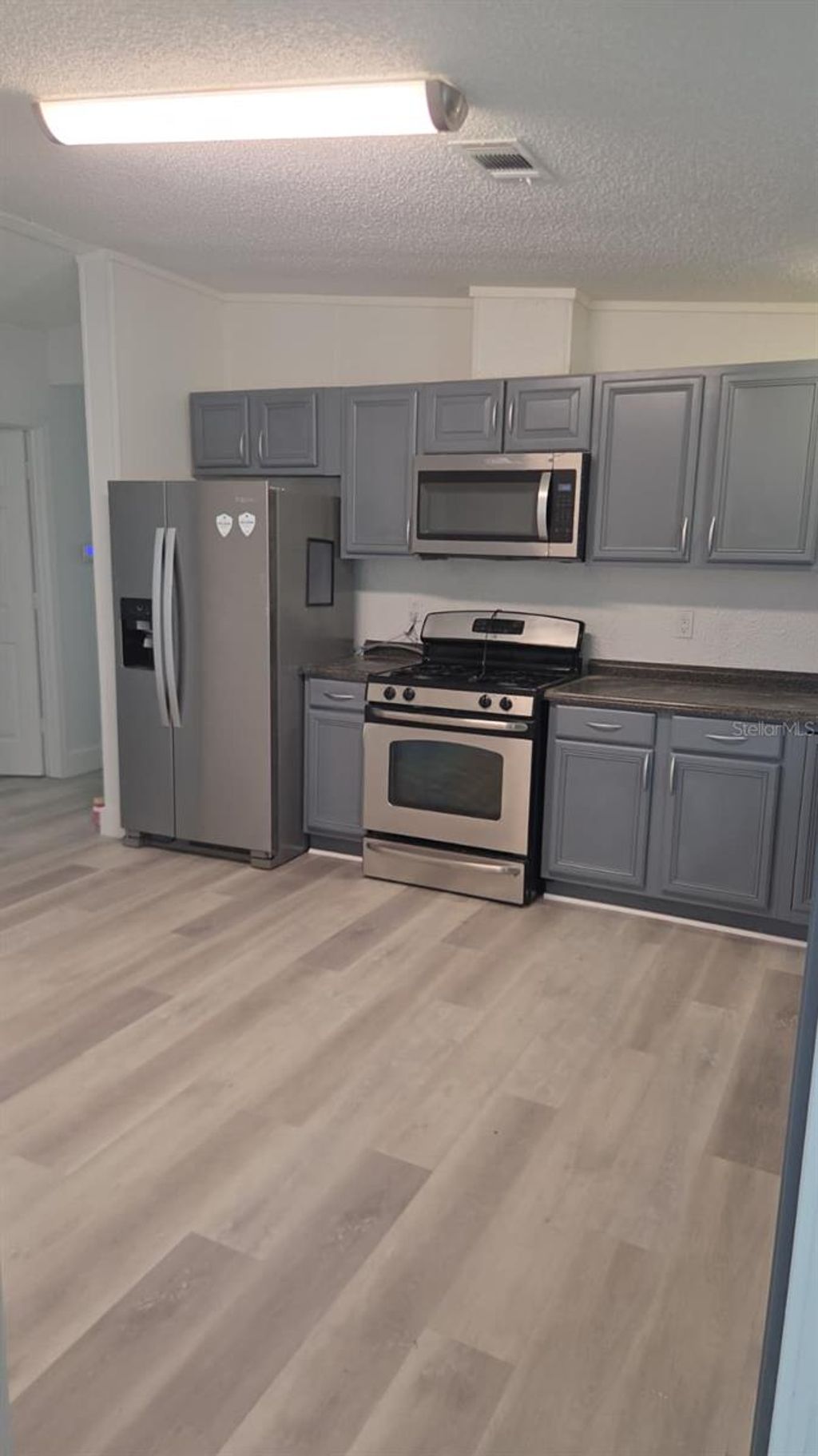 Photo of 6999 Pompeii Road, Orlando, FL 32822 (MLS # O6422614)
