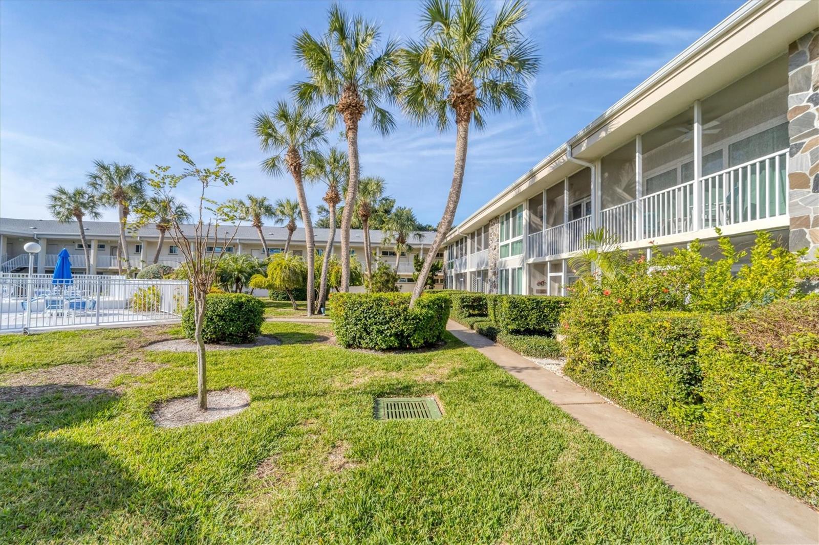 LOCATION, LOCATION! LIDO BEACH DREAM VACATION CONDO in popular Kingston Arms, located on Historic St. Armands Circle, walkable to all that you want and need, the beach, the shops, the award-winning restaurants and more! This lovely condo features many upgrades, the most recent is a brand new step in shower and vanity! New Travertine flooring throughout and new lighting, new furniture, linens and applicances make this the perfect vacation spot! Right outside your door is the sparkling community pool and spa, you have one covered parking space but there is really no need for a vehicle, take the Bay Runner Trolley downtown, rent some bikes and ride to Longboat Key, or schedule your guided private Mangrove Tunnel tour at Ted Sperling Park. Paradise awaits! Currently currently booked through the April 10th 2025. Available in April and beyond for long and short-term rentals, call for rates!