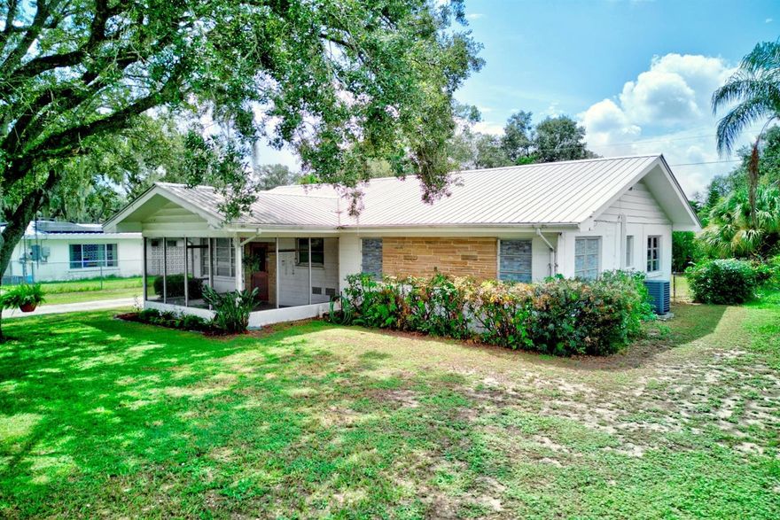 Charming and well-maintained 3-bedroom, 2-bath single-story home with a bonus room and dedicated office, ideally located in the heart of downtown Avon Park. Built in 1959, this residence blends classic character with thoughtful updates, including a durable metal roof and instant hot water heater. The versatile floor plan offers spacious living areas, terrazzo and tile flooring, and abundant natural light. Situated on a fully fenced lot, the property includes two storage sheds/workshop and a 1-car carport, providing ample space for tools, hobbies, or extra storage. Conveniently located near local shops, dining, and community amenities, this home offers comfort, functionality, and small-town charm with no HOA. A must-see opportunity for full-time living or investment.