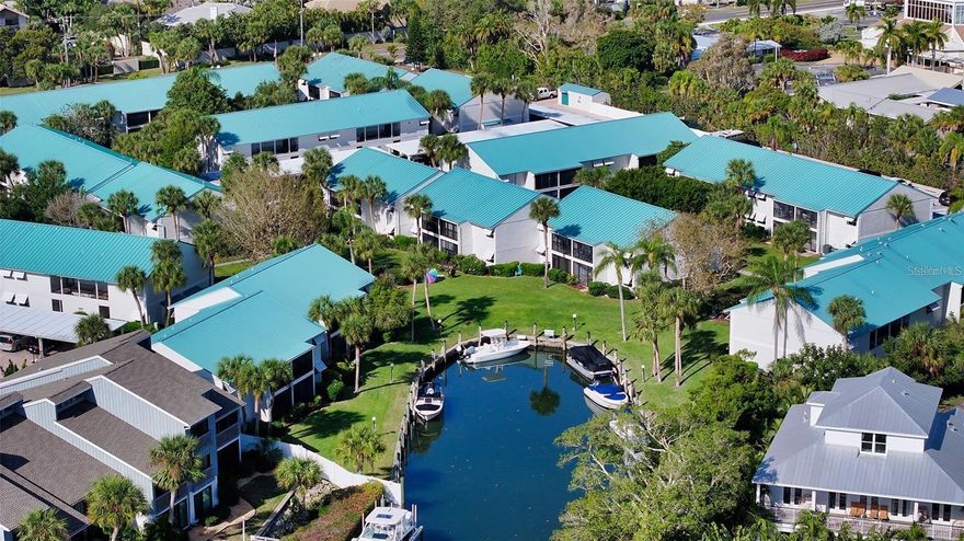 Welcome to the World-famous Siesta Key Beach. This 2-bedroom 1 bath furnished open floor plan condo is move in ready.  Looking to enjoy living the beach lifestyle in Paradise at a great price. This property offers a heated swimming pool, sauna, nice club house, grills. The property also offers boat slips available to check out the intercoastal! Pet friendly! Siesta Key offers volleyball, pickle ball, nature trails as well as shopping, restaurants, live entertainment! Come check out Paradise