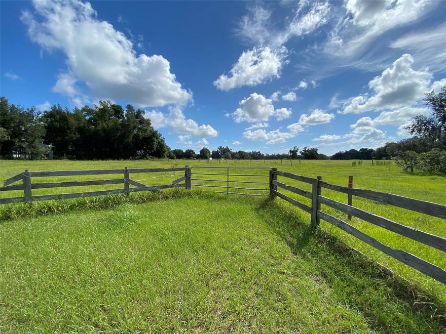 Make this 14 acres M.O.L. your homesite located in southern Sumter County, Florida, approximately 4.5 miles from the Webster Flea Market and 20 miles west of Clermont.  Or, subdivide it into 3 separate parcels.  Lot 7 (Parcel T20B047) and Lot 8 (Parcel T20B048), Block 5 of Roberts Addition to Linden, each comprise about 2.3 acres and both measure about 320 ft. by 324 ft.  Parcels are partially fenced.  The third un-plated Parcel T20-034 (Lot 9) comprises about 10 acres, measures about 320 ft. by 1,340 ft., Contains numerous large live oak trees and borders Giddon Lake to the south in the Richloam Wildlife Management Area.  This pasture property is currently under a yearly cattle lease with an agricultural property tax exemption.  Lot 7 is accessible from County Road 772C and an electric power line runs through it.  Most of this property is located in Zone X flood zone.  Prospective buyers must be represented by an agent.